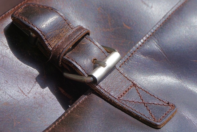 A close up of a brown leather satchel briefcase.