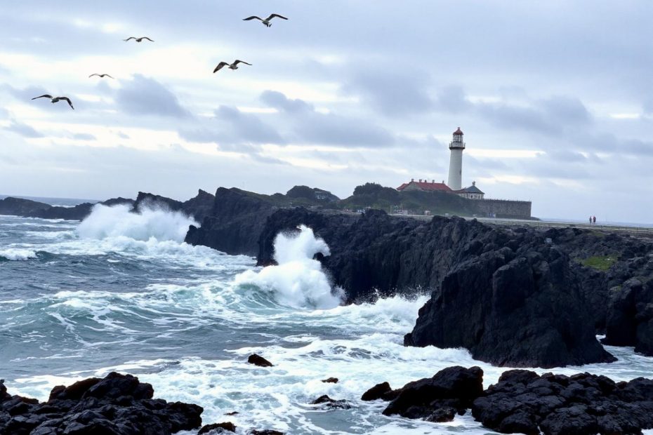 Amid crashing waves and rugged cliffs, two figures stroll by a lighthouse, capturing the coastal chic vibe on their Leia Lume Pad 2.