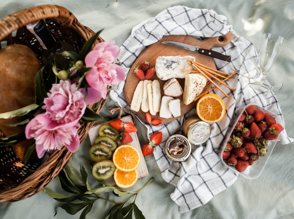 A picnic basket filled with the finest fruit and outstanding cheese.