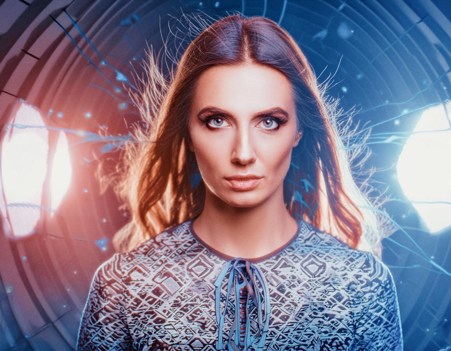 A modern city dweller with long hair stands confidently against a neon-lit, abstract backdrop. Her patterned top and intense gaze showcase urban edge.