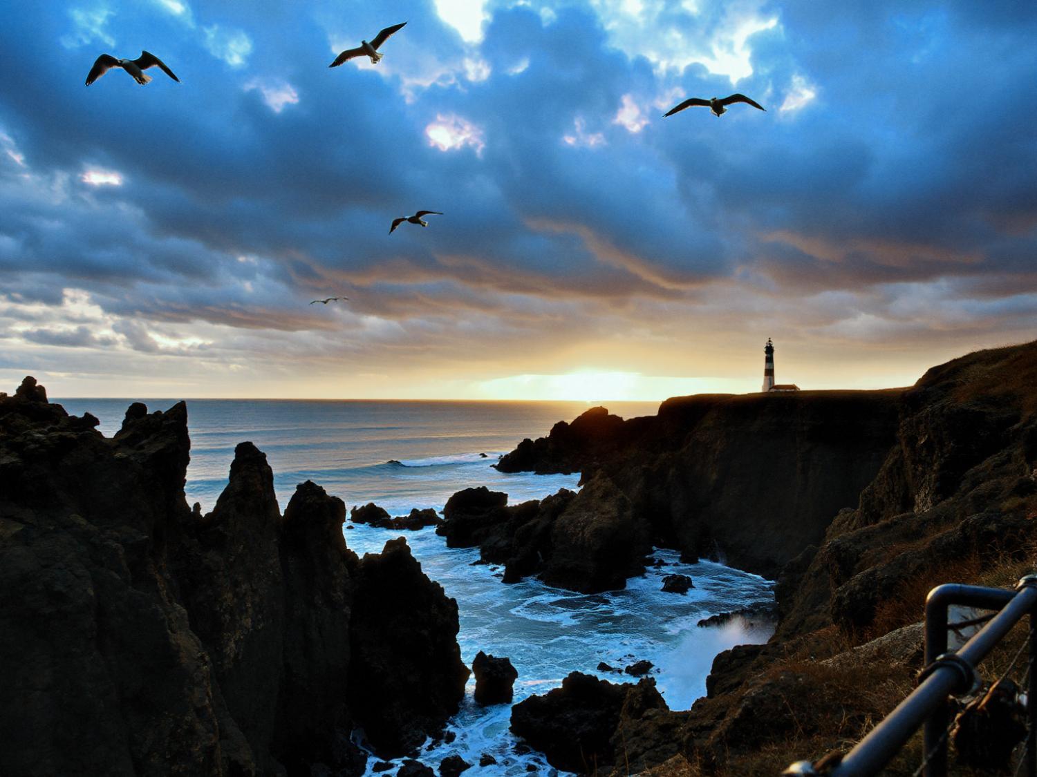 A sunset coastal scene with cliffs, a glowing horizon, and guiding lighthouse. A timeless blend of nature's drama and nautical-inspired style.