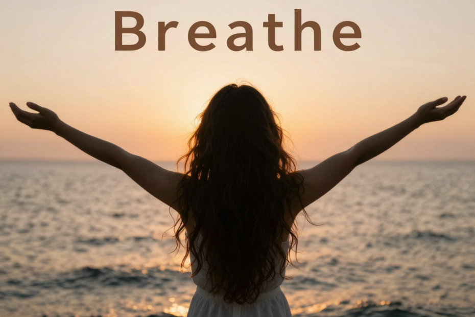 Woman with outstretched arms faces the sunset ocean, "Breathe" above her—evoking serenity and effortless tote-bag style by the shore.